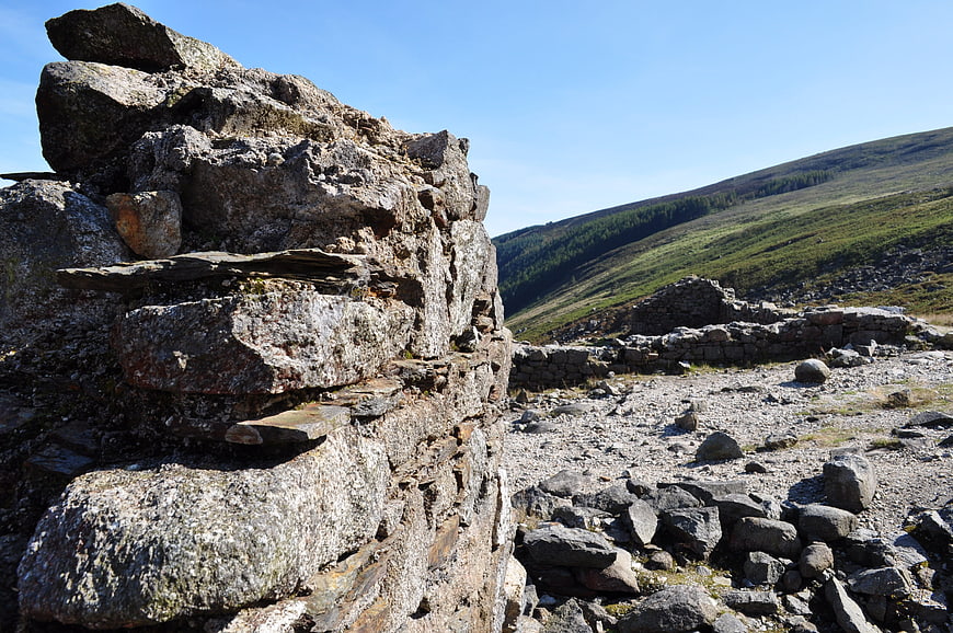 Ancient stone ruins in a rugged mountain landscape