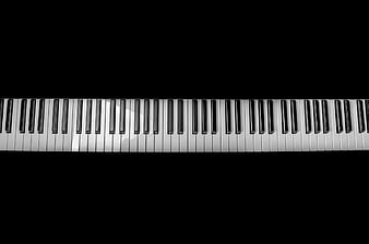 Piano Keys on Black Background with Copyspace