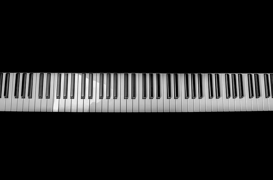 Piano Keys on Black Background with Copyspace