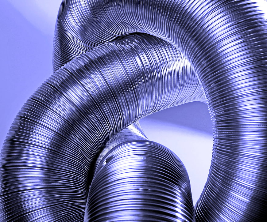 Abstract Close-Up of Twisted Flexible Aluminum Ventilation Duct