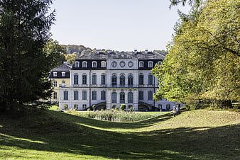 Wilhelmsthal Palace in Calden, Germany with lush green park