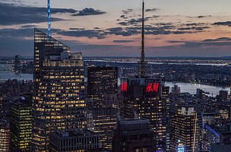 New York City Skyline at Dusk with H&M Sign