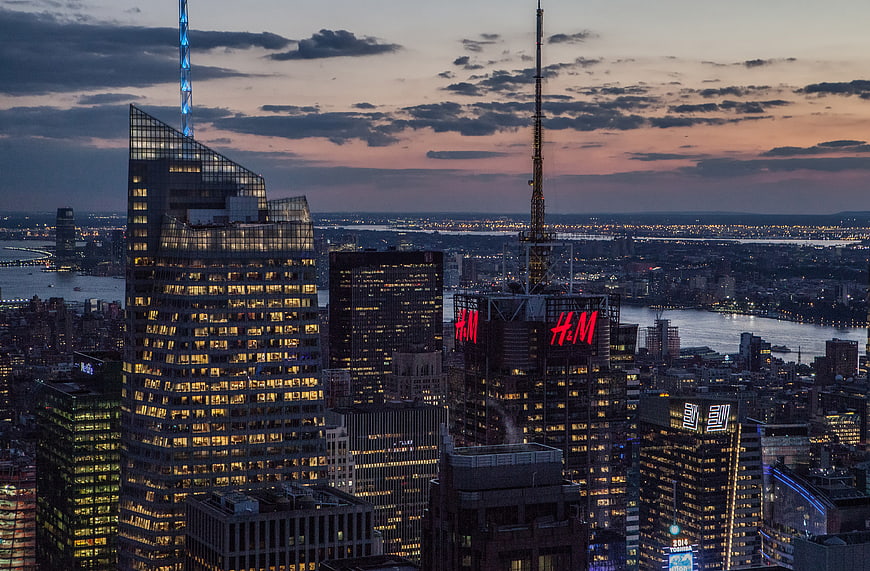 New York City Skyline at Dusk with H&M Sign