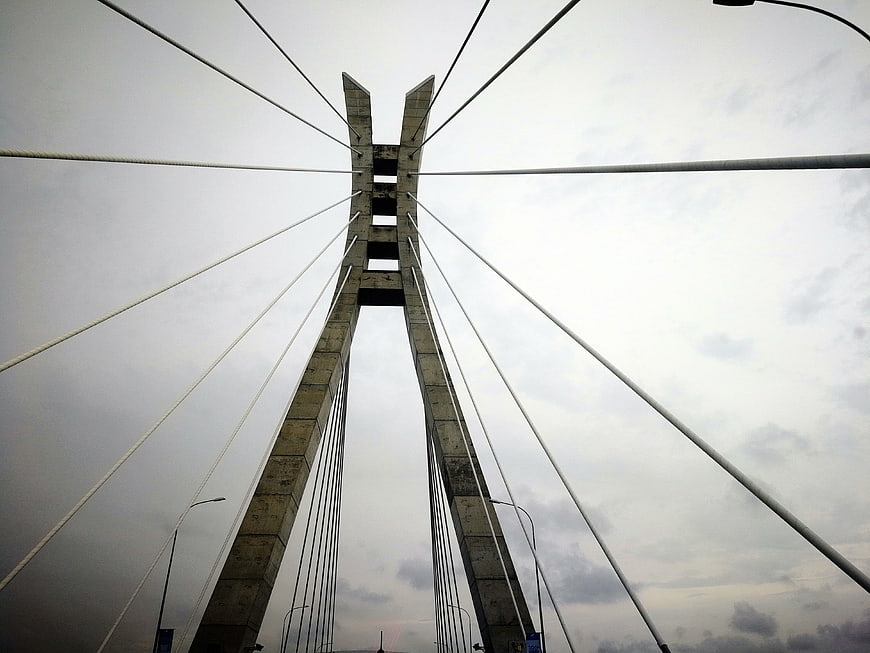 Low angle view of modern cable-stayed bridge tower