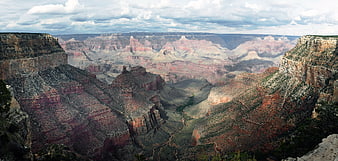 Panoramic View of Grand Canyon with Cloudy Sky