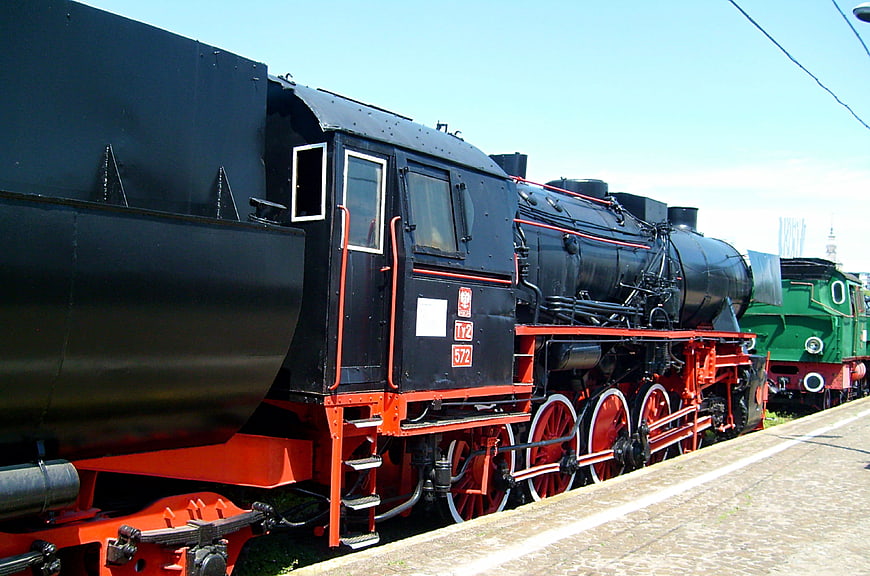 Vintage Black Steam Locomotive on Railway Tracks