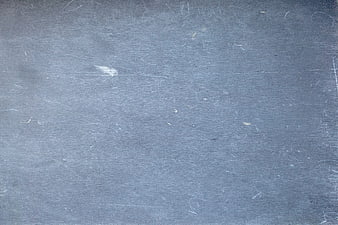Empty Dark Chalkboard Texture With Faint Chalk Marks And Scratches
