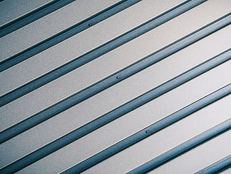 Abstract diagonal blue metal siding texture background