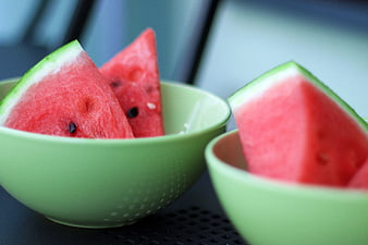 Fresh Watermelon Slices in Green Bowls
