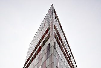 Low angle view of modern skyscraper with colorful facade