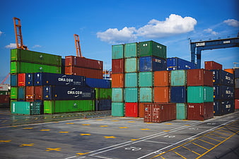 Stacked Shipping Containers at Port Terminal