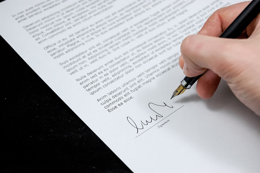 Hand Signing Document with Fountain Pen