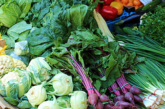 Fresh Organic Vegetables Displayed At A Local Farmers Market Stall