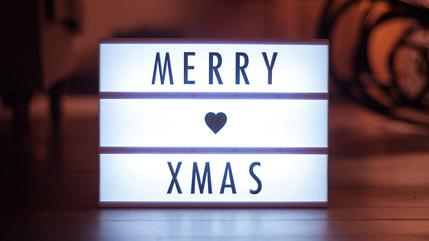 Merry Xmas Light Box Sign on Wooden Floor