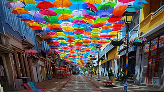 Colorful Umbrella Street Art Installation in City