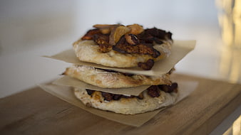 Stack of savory flatbread sandwiches with roasted vegetables