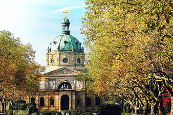 Baroque Cathedral with Green Dome in Autumn Park