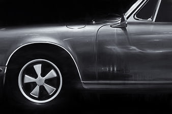Close-up of vintage Porsche 911 SD side profile in black and white