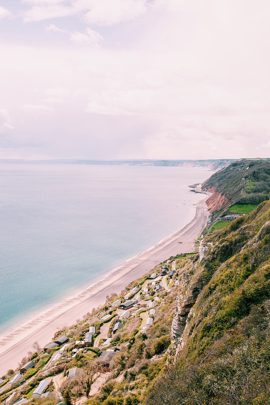 Aerial View of Coastal Cliffs and Sandy Beach Landscape
