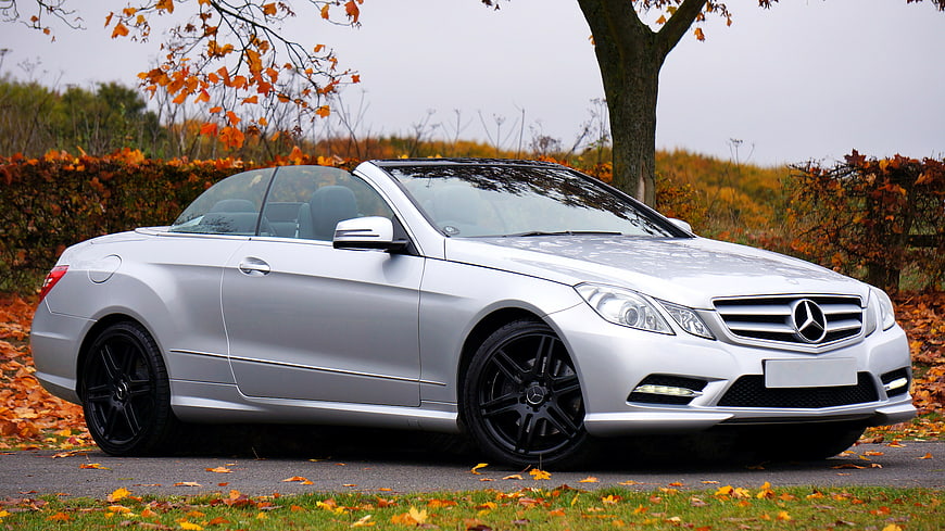 Silver Mercedes-Benz E-Class Convertible in Autumn