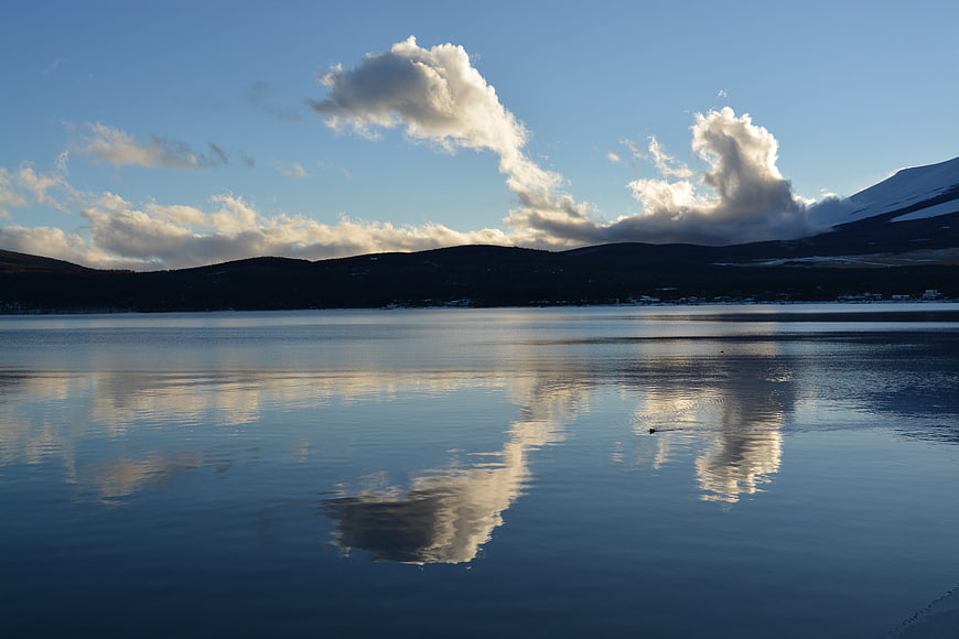 Serene Lake Yamanaka Reflection with Mount Fuji and Clouds