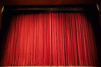 Closed Red Velvet Theater Curtain On Stage