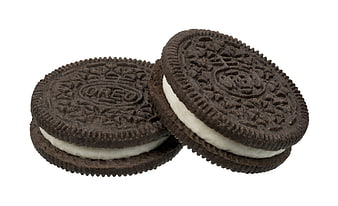 Two Chocolate Sandwich Cookies With White Cream Filling On White Background
