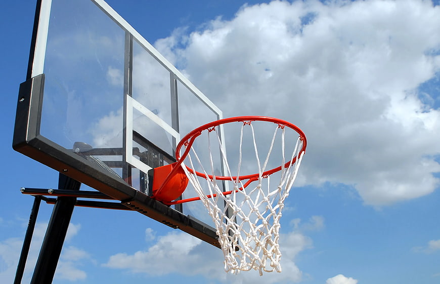 Outdoor Basketball Hoop Against Blue Sky