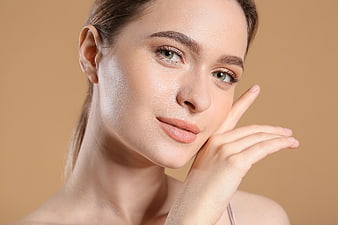 Close-up portrait of beautiful woman with fresh skin