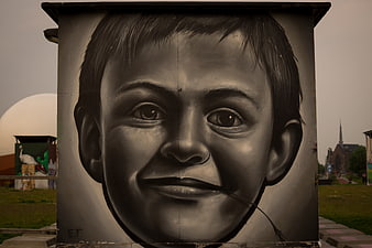 Realistic Black and White Mural of a Boy's Face