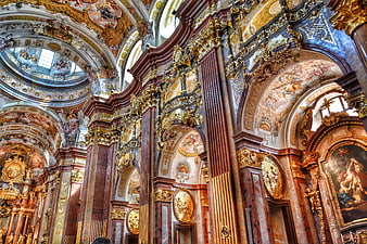 Ornate Baroque Church Interior with Gold Details and Frescoes