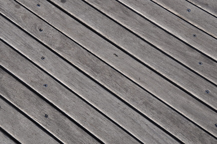 Diagonal Gray Wooden Deck Planks Texture Background