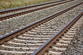 Double railway tracks with concrete sleepers and gravel ballast