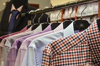 Colorful Men's Dress Shirts on Rack in Clothing Store