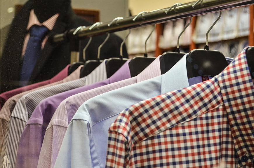Colorful Men's Dress Shirts on Rack in Clothing Store