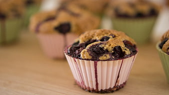 Close-up of Fresh Blueberry Muffin on Wooden Table