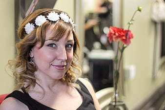 Portrait of Woman with White Flower Headband