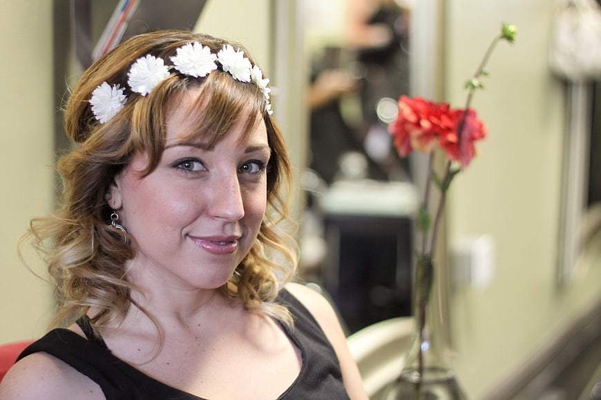 Portrait of Woman with White Flower Headband