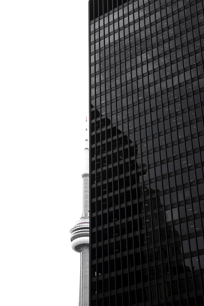 Modern Skyscraper with CN Tower in Background