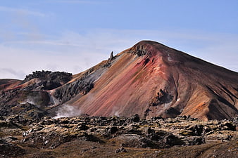 Colorful volcanic mountain with steam vents in Iceland