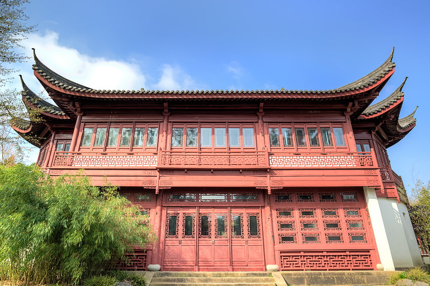 Traditional Chinese Red Temple Building with Curved Roof