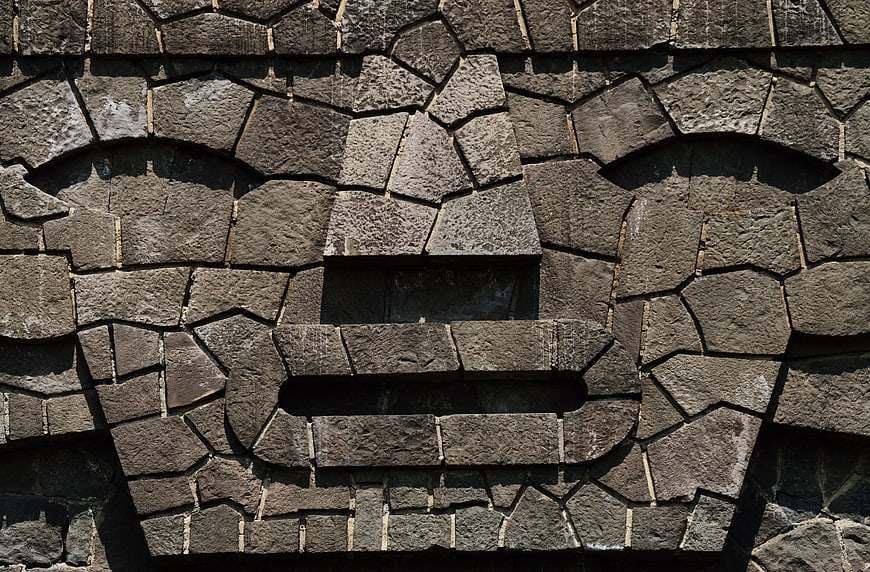 Stone Face Sculpture on University City UNAM Wall