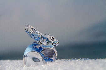 Glass Easter Bunny Sculpture on Snow