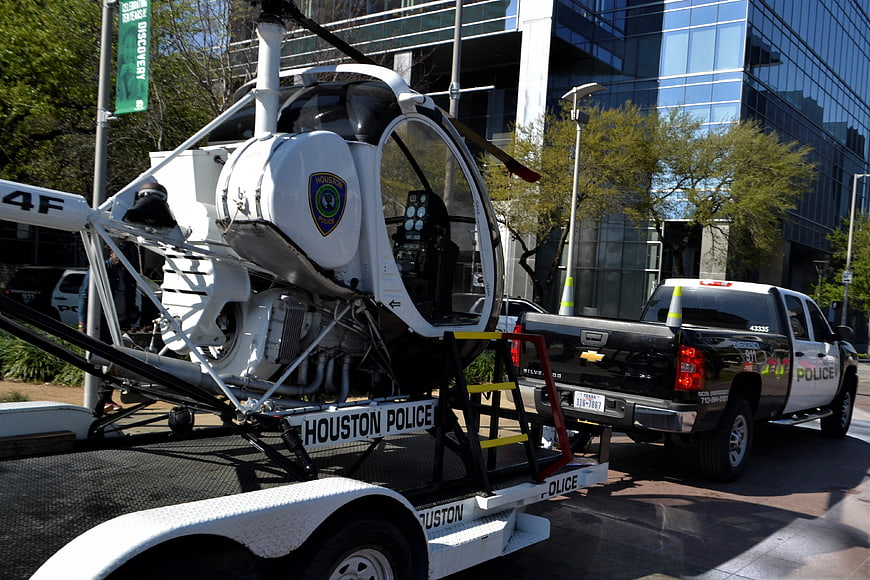 Houston Police Autogyro and Pickup Truck Parked on City Street