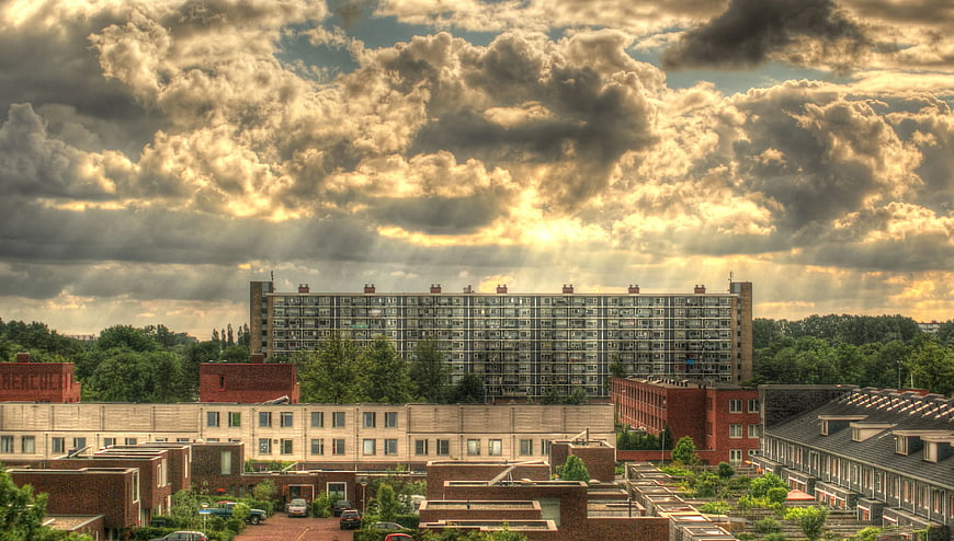 Dramatic Sun Rays Over Urban Residential Complex