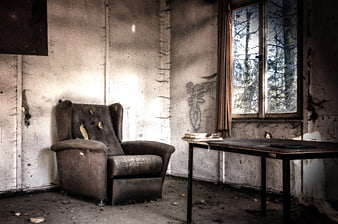 Abandoned Room with Old Chair and Table