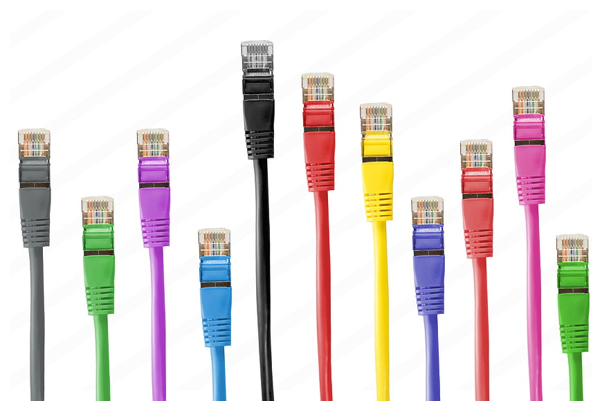 Multicolored RJ45 Ethernet Network Cables on White Background