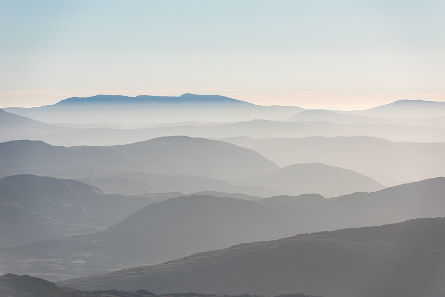 Misty Mountain Layers in Soft Morning Light