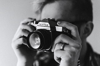 Man Holding Vintage Pentax Camera Close Up