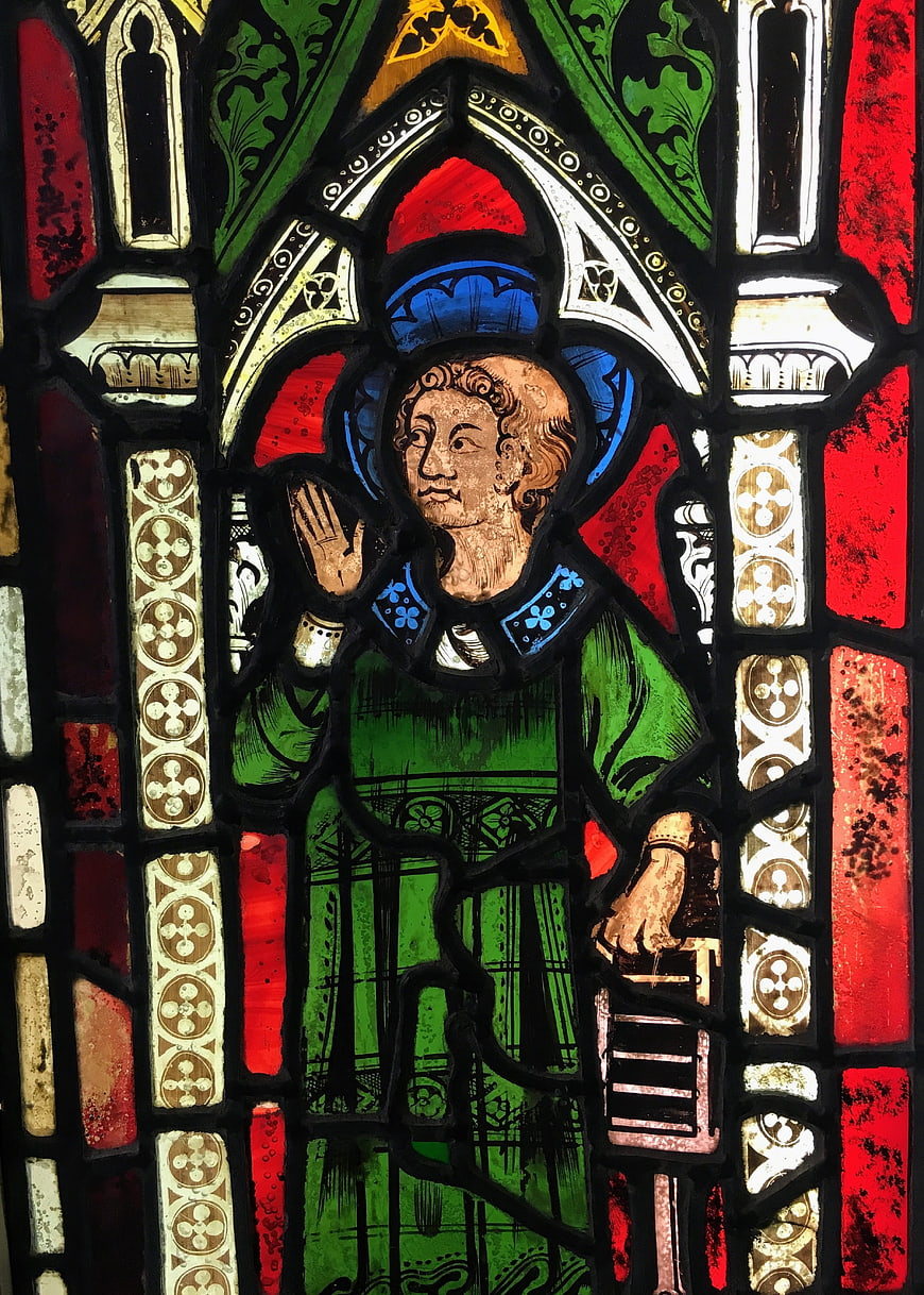 Medieval Stained Glass Window Depicting a Saint in Green Robes